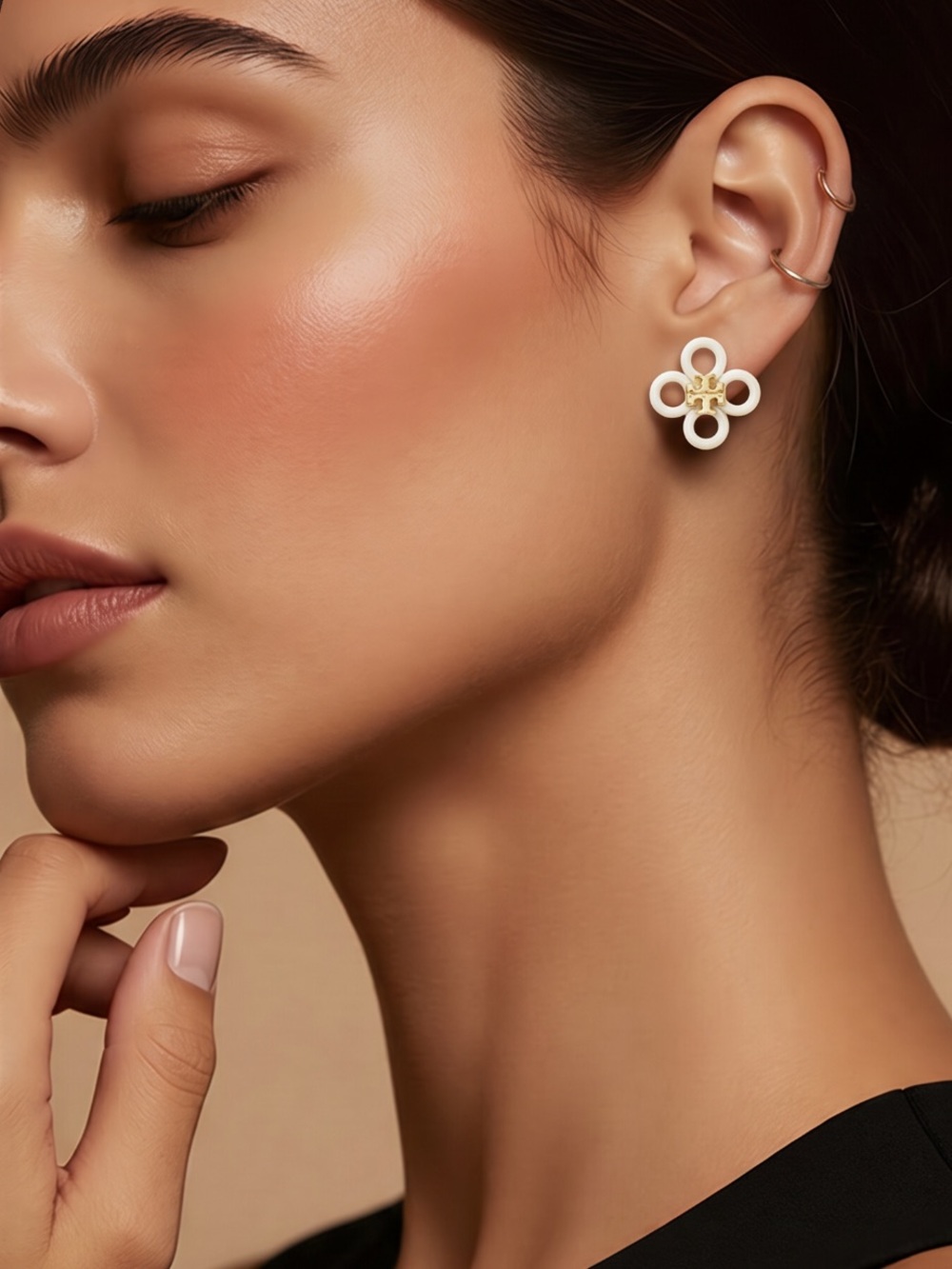 - Tori Burch Kira Four CloverLeaf Stud Earrings.